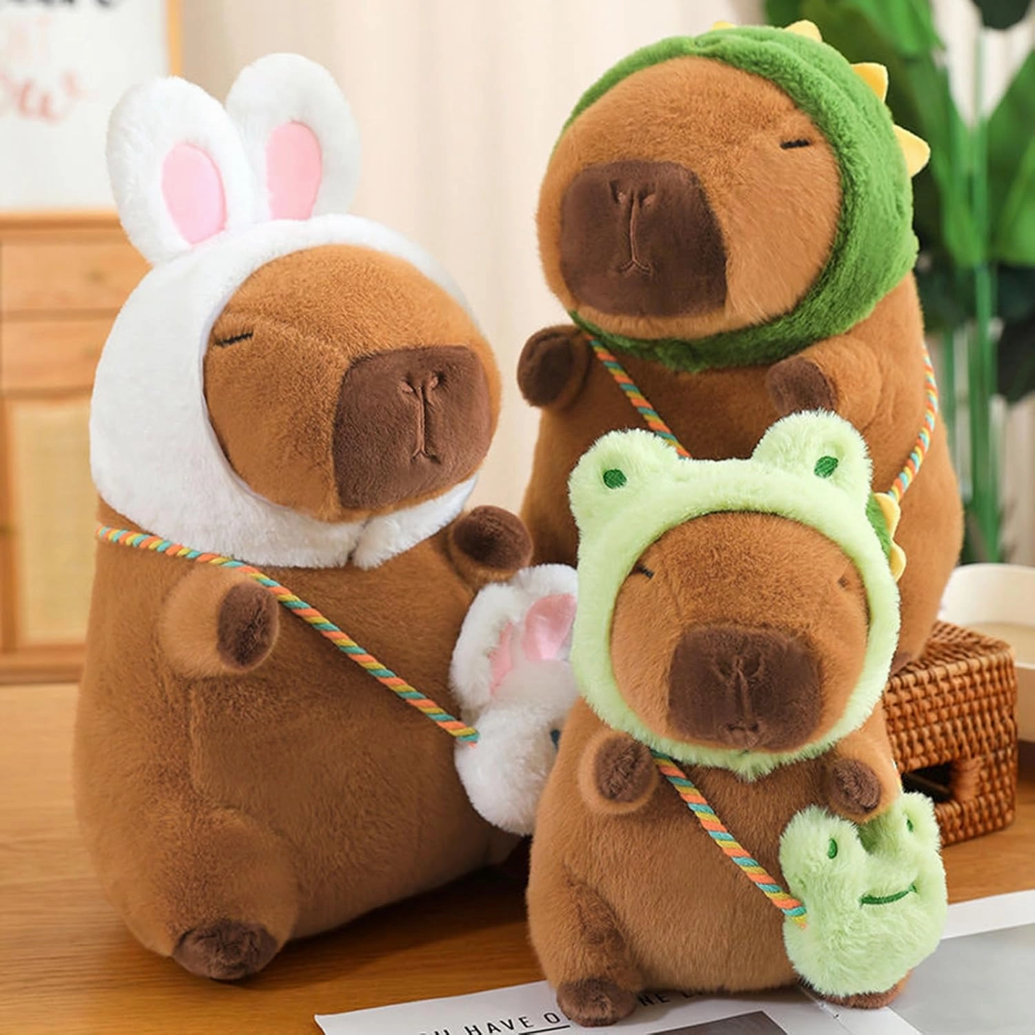 Ditucu Capybara Plush with Dinosaur Hat & Mini Bag 9.8 inch Cute Dino Capibara Stuffed Animal Soft Plushies Toys Gifts for Kids Adults Brown