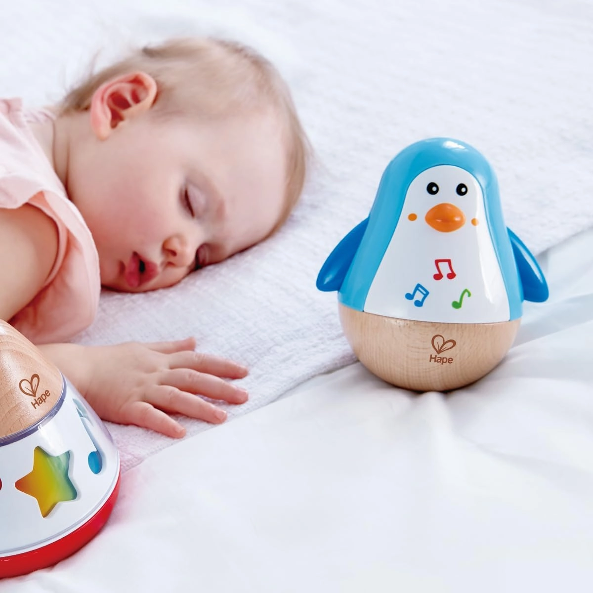 Hape Penguin Musical Wobbler | Colorful Wobbling Melody Penguin, Roly Poly Toy for Kids 6 Months , Multicolor, 5'' x 2'' (E0331)