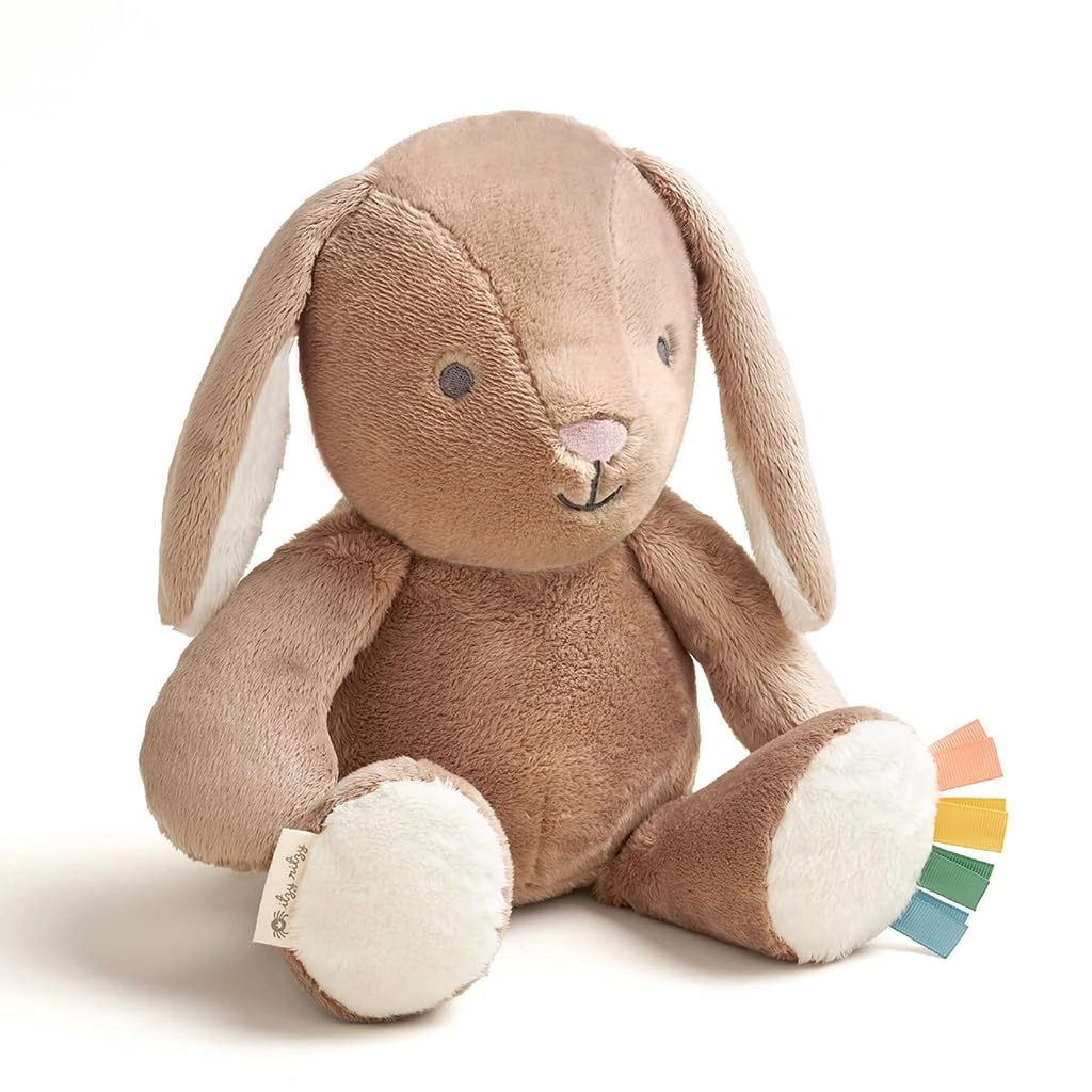 Itzy Ritzy Baby Plush Toy – Soft Stuffed Animal for Babies & Kids – Sensory Ribbons & Textured Fabrics for Tactile Play – Cozy & Cuddly Companion for Newborns & Up (Taupe Bunny)