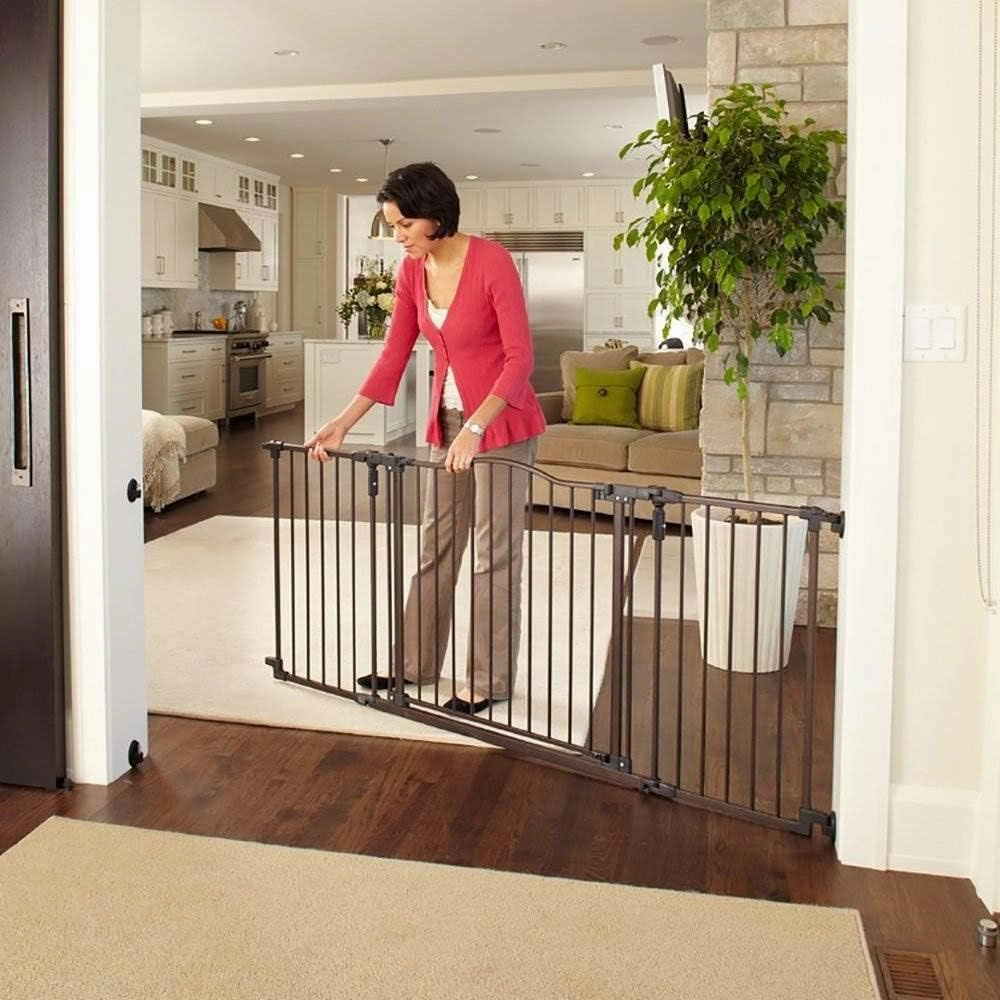 Toddleroo by North States 72” wide Deluxe Décor Baby Gate: Sturdy safety gate with one hand operation. Extra wide baby gate. Hardware Mount. Fits 38.3 - 72” Wide. (30" Tall, Matte Bronze)